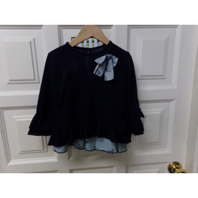 Conjunto de falda y camiseta talla 6 años. Segunda mano