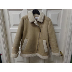 Abrigo Zara piel vuelta talla 9 años. Segunda mano