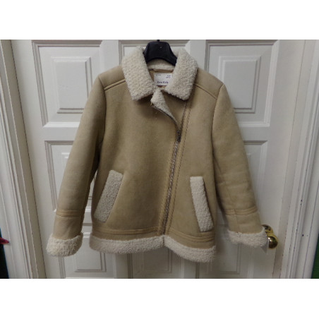 Abrigo Zara piel vuelta talla 9 años. Segunda mano