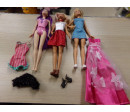 3 Barbies. con ropita. Segunda mano