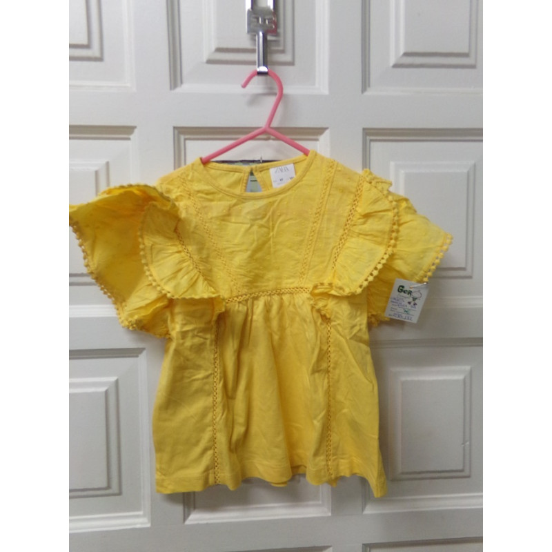 Camiseta amarilla talla 7 años. Segunda mano
