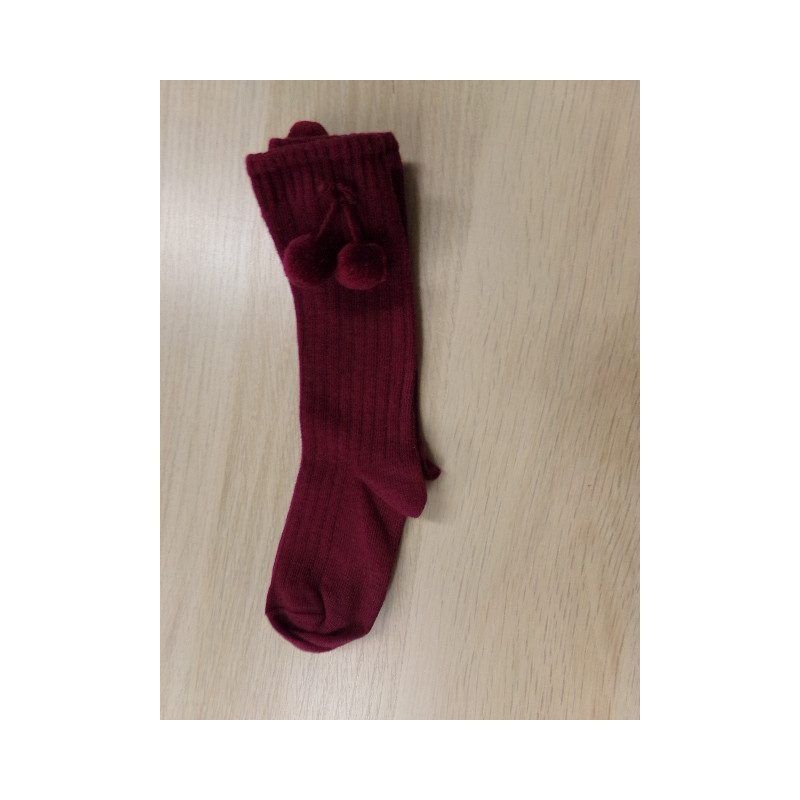 Calcetines nº 22-24 granate con pompones. Sin uso.