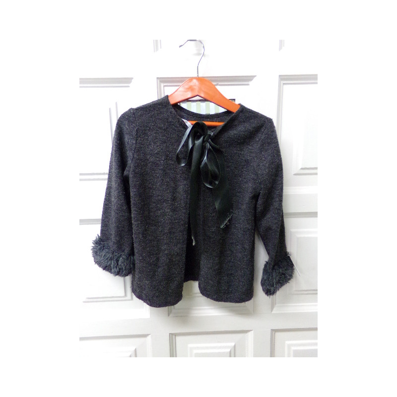 Chaqueta gris con lazo 6 años. Segunda mano.