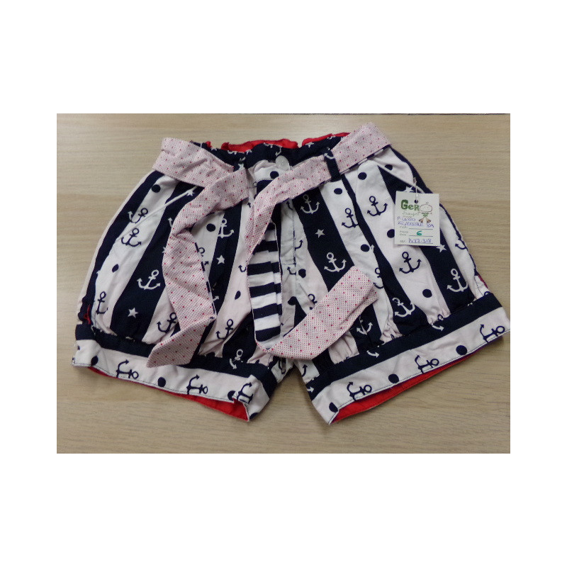 Pantalón corto reversible 8 años. Segunda mano.