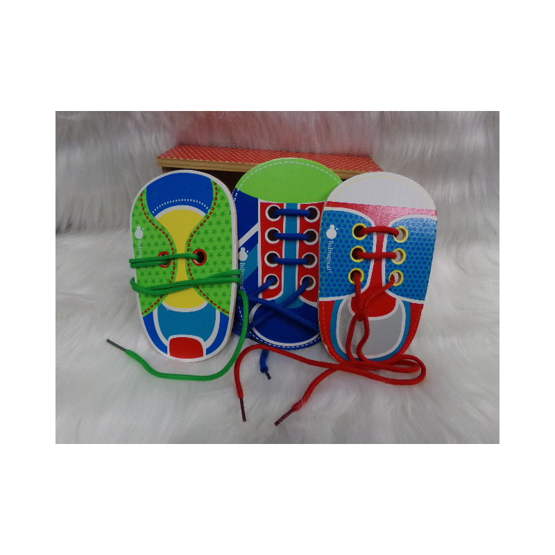 Juego para aprender atar cordones. Segunda mano.