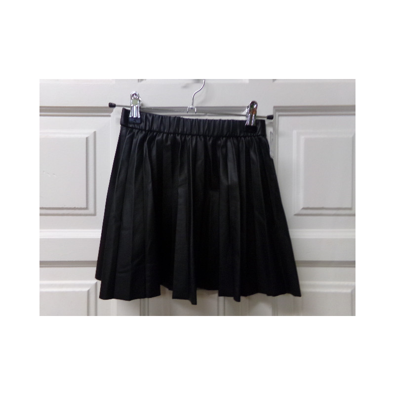 Falda polipiel 7 años. Segunda mano.