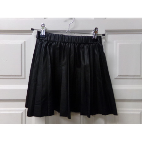 Falda polipiel 7 años. Segunda mano.