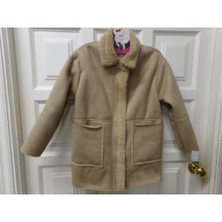 Abrigo piel vuelta pelito camel Zara 8 años. Segunda mano.