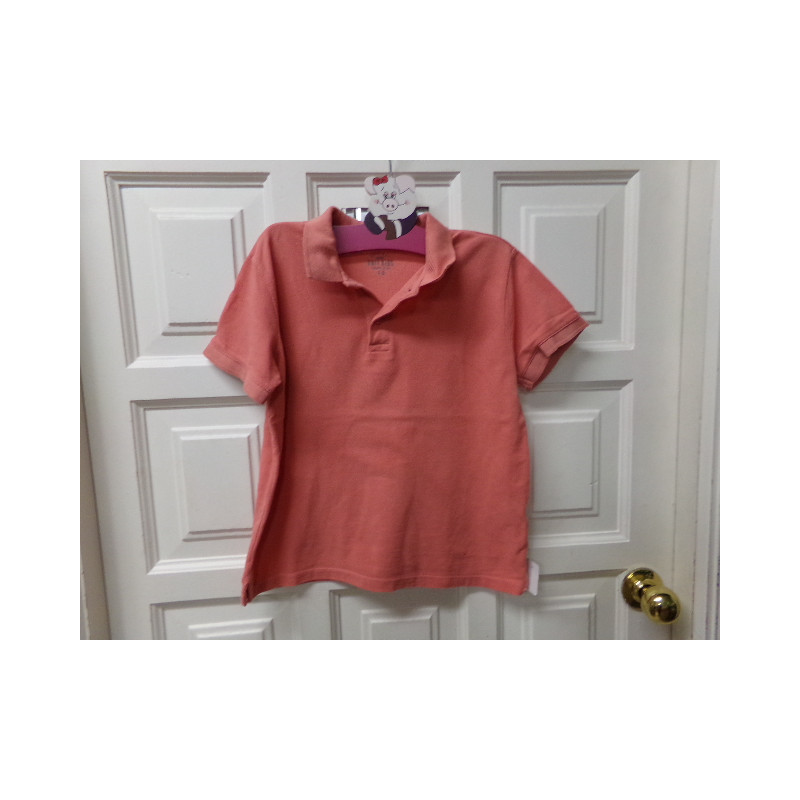 Polo naranja m/c 8-10años. Segunda mano.