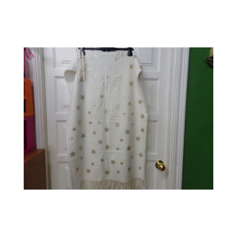 Mantita beig con estrellitas. Sin uso.