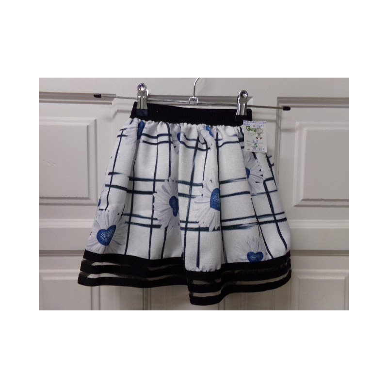 Falda blanca y negra 4 años. Segunda mano.