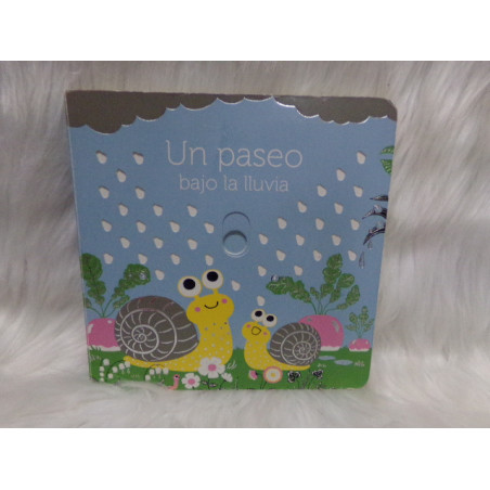 Libro un paseo bajo la lluvia. Segunda mano.