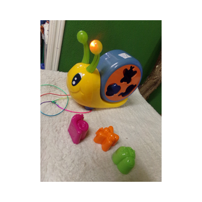 Encajable caracol con sonido. Segunda mano