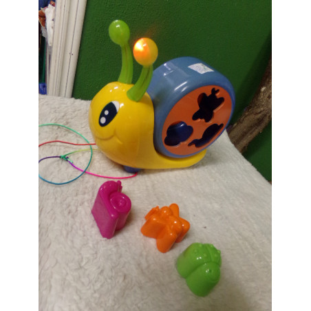 Encajable caracol con sonido. Segunda mano