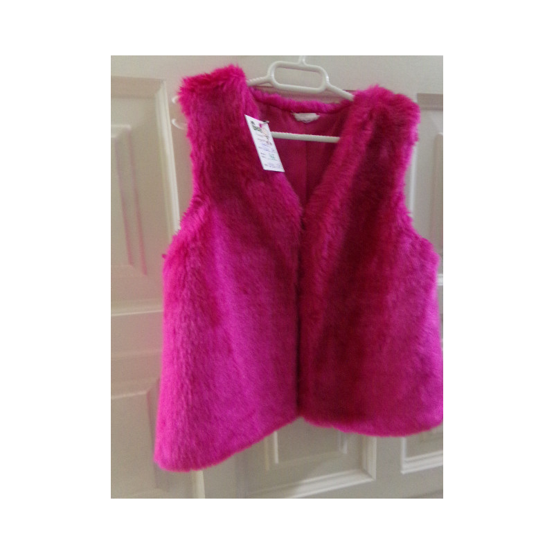 Chaleco fucsia talla 7 años. Segunda mano