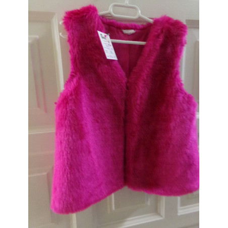 Chaleco fucsia talla 7 años. Segunda mano