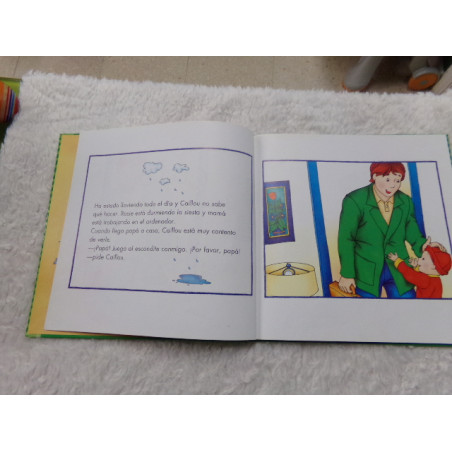 Caillou en la biblioteca