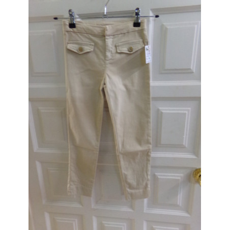 Pantalón beig talla 7 años. Segunda mano