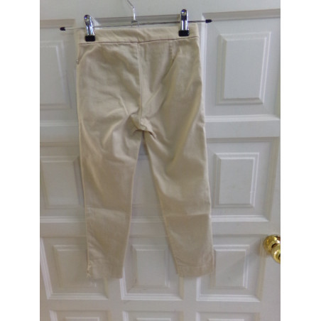 Pantalón beig talla 7 años. Segunda mano