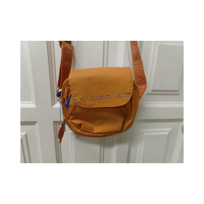 Bandolera naranja. Segunda mano