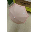 Sombrilla rosa de tela. Segunda mano