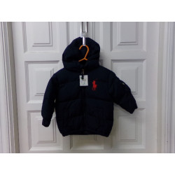 Plumas azul de  Zara talla 4 años. Segunda mano