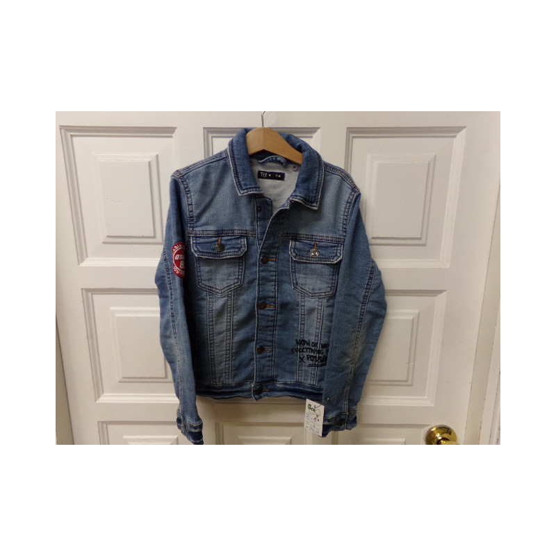 Cazadora vaquera talla 7-8 años. Segunda mano