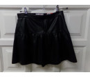 Falda polipiel talla 13-14 años. Segunda mano