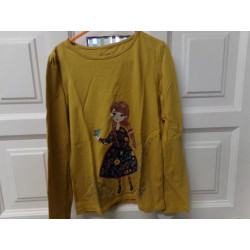 Camiseta mostaza talla 8 años. Segund amano