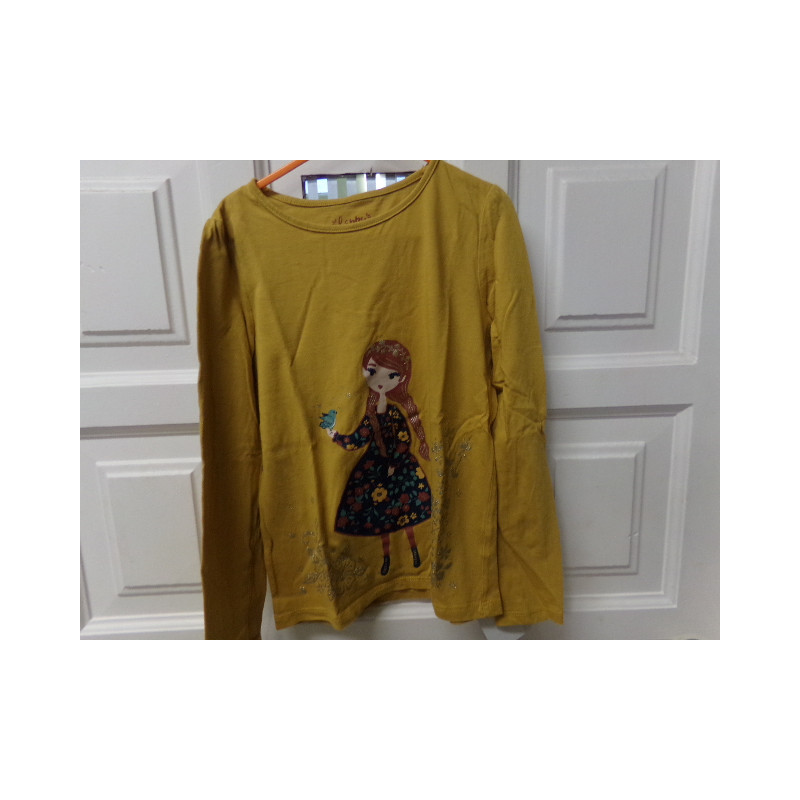 Camiseta mostaza talla 8 años. Segund amano