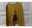 Camiseta mostaza talla 8 años. Segund amano
