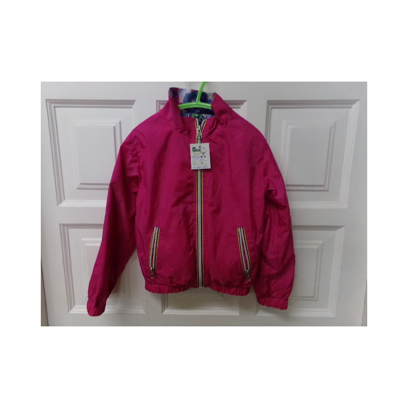 Cortavientos fucsia talla 6 años. Segunda mano