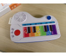 Piano guitarra Baby Einstein. Segunda mano